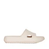 Acquista slipper in gomma color crema da TORY BURCH