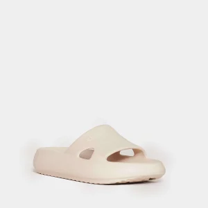 Acquista slipper in gomma color crema da TORY BURCH