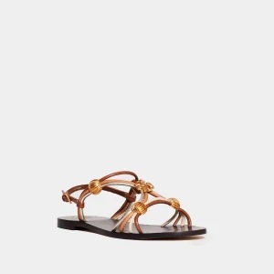 Sandali bassi in pelle e cinturini platinati di Tory Burch