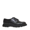 Scarpe derby nere con suola in gomma: eleganza e comfort