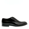 Scarpe eleganti Doucal's: stringate nere con suola in cuoio