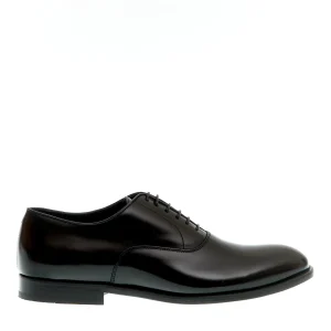 Scarpe eleganti Doucal's: stringate nere con suola in cuoio