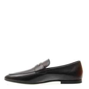 Scarpe Tod's: eleganti mocassini in pelle nera con suola in cuoio